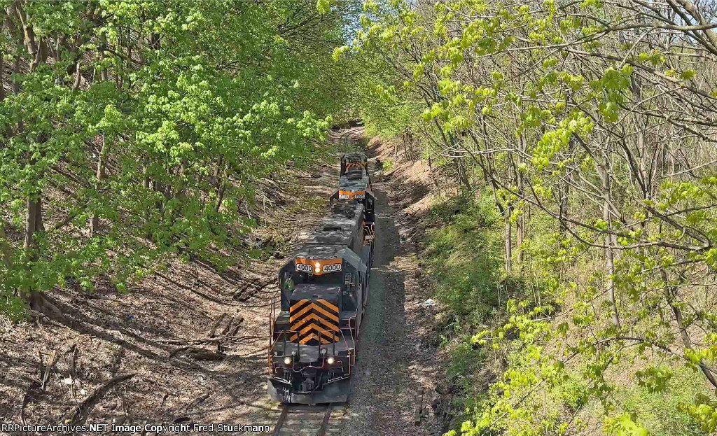 WE 4000 leads the power under Arlington St. on their way back to Brittain Yd.